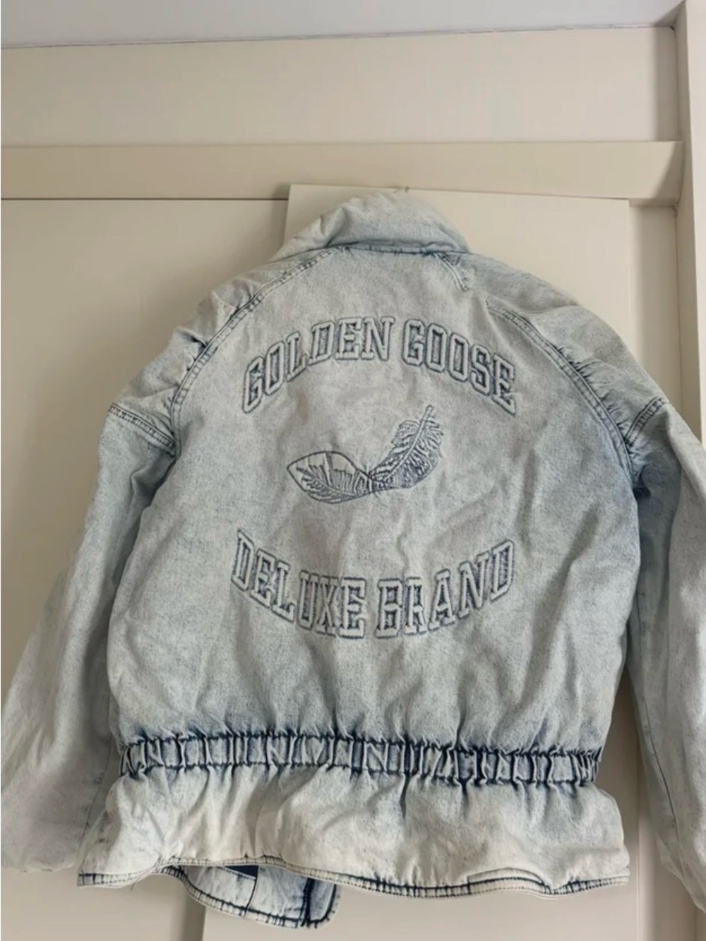 Golden Goose White Care Tag with Black Logo and Text